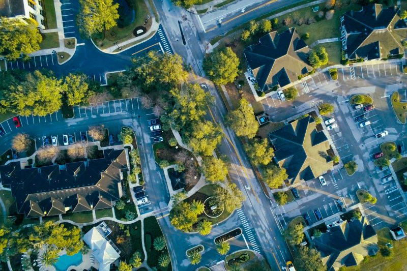 Aerial view of Lake Mary, FL, featuring residential streets bordered by lush greenery.